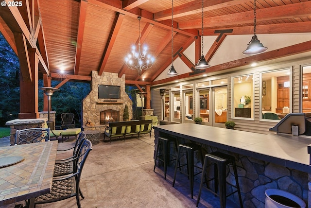 2812 Beacon Hill Dr, West Linn, OR 97068 - view of patio with an outdoor stone fireplace and exterior bar