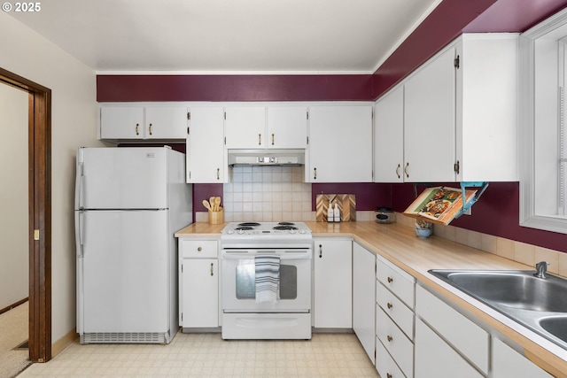 44505 SW Knight Rd, Gaston, OR 97119 - kitchen with white appliances, light flooring, a sink, under cabinet range hood, and white cabinets