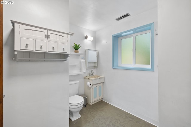 44505 SW Knight Rd, Gaston, OR 97119 - bathroom featuring toilet, vanity, and baseboards