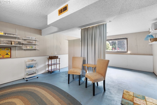 44505 SW Knight Rd, Gaston, OR 97119 - living area with concrete flooring and a textured ceiling