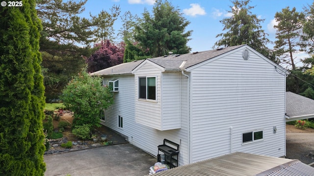 44505 SW Knight Rd, Gaston, OR 97119 - view of side of home featuring a shingled roof and a patio