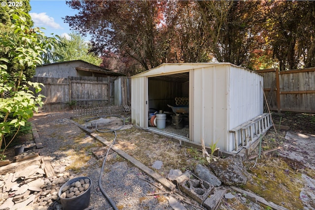 44505 SW Knight Rd, Gaston, OR 97119 - view of shed with a fenced backyard