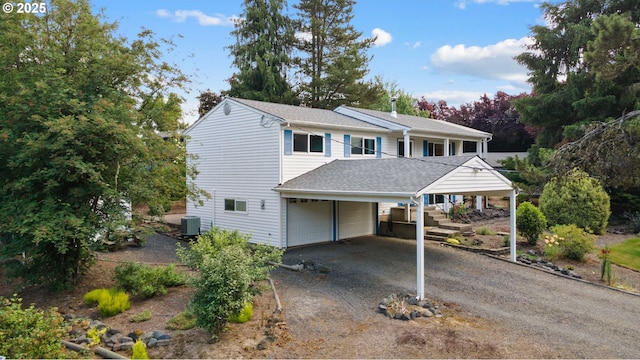 44505 SW Knight Rd, Gaston, OR 97119 - view of front facade with central AC, a shingled roof, and driveway