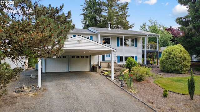 44505 SW Knight Rd, Gaston, OR 97119 - view of front of property featuring a garage, driveway, and a balcony