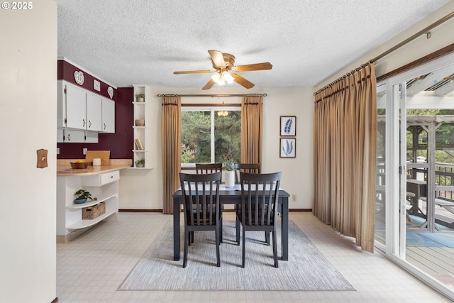 44505 SW Knight Rd, Gaston, OR 97119 - dining area with a ceiling fan, a textured ceiling, light floors, and baseboards