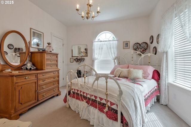 34085 Berg Rd, Warren, OR 97053 - bedroom featuring light carpet and a chandelier