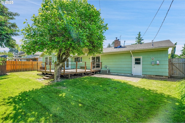 4803 SE Fieldcrest Dr, Milwaukie, OR 97222 - back of house featuring a deck, a chimney, and cooling unit