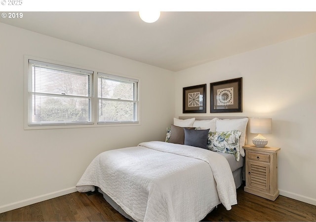 2747 NE Bryant St, Portland, OR 97211 - bedroom with baseboards and dark wood finished floors