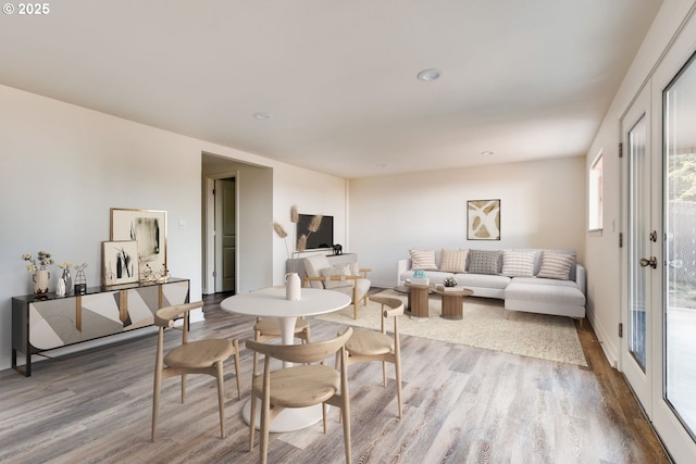 2747 NE Bryant St, Portland, OR 97211 - dining space featuring wood finished floors and recessed lighting