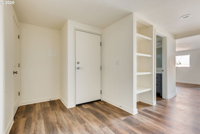 2747 NE Bryant St, Portland, OR 97211 - foyer entrance featuring wood finished floors and baseboards