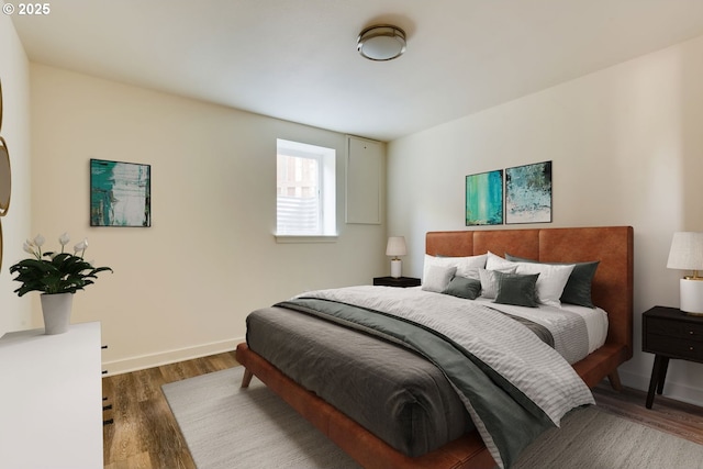 2747 NE Bryant St, Portland, OR 97211 - bedroom with dark wood-style floors and baseboards