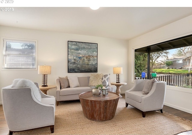 2747 NE Bryant St, Portland, OR 97211 - living area featuring light wood finished floors and baseboards
