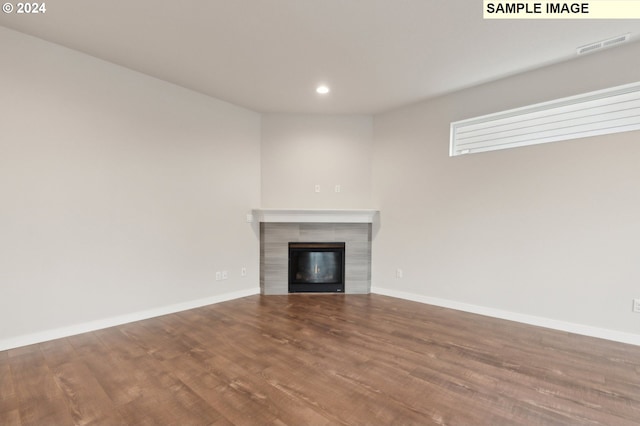 4205 NE 186th St Lot 265, Vancouver, WA 98686 - unfurnished living room with a fireplace, recessed lighting, wood finished floors, and baseboards