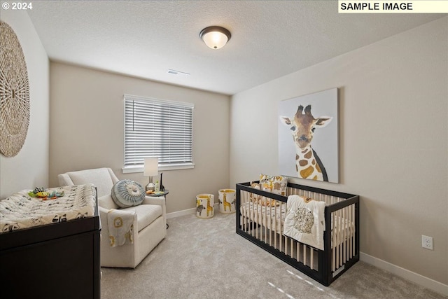 4205 NE 186th St Lot 265, Vancouver, WA 98686 - bedroom with a crib, carpet flooring, and baseboards