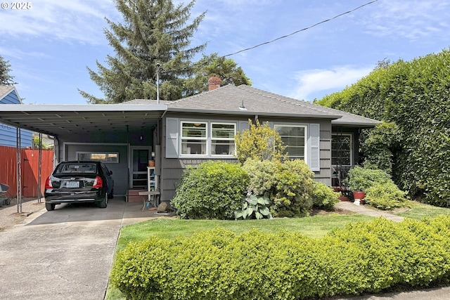 6325 SE 77th Ave SE, Portland, OR 97206 - view of front of property featuring driveway, a carport, and a chimney