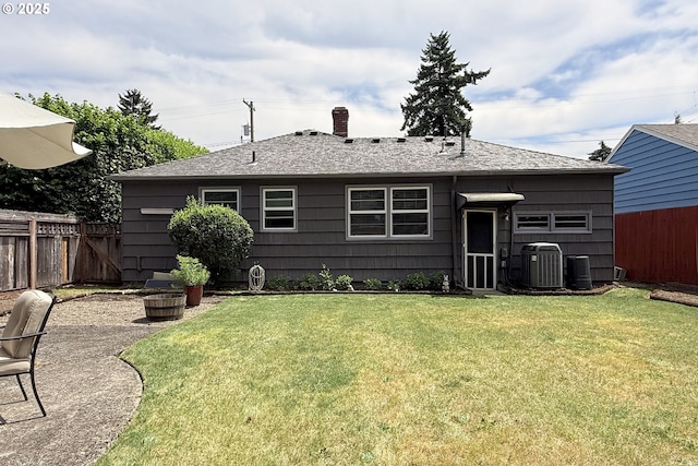 6325 SE 77th Ave SE, Portland, OR 97206 - back of house with a chimney and roof with shingles