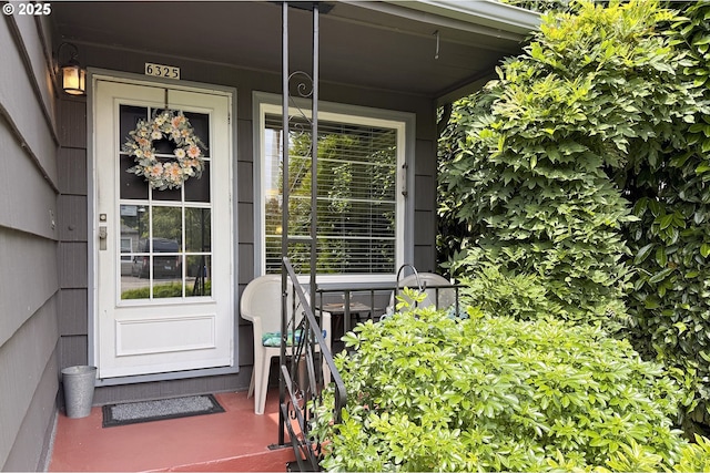 6325 SE 77th Ave SE, Portland, OR 97206 - doorway to property featuring covered porch