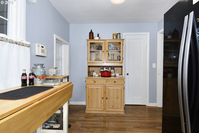 6325 SE 77th Ave SE, Portland, OR 97206 - kitchen with freestanding refrigerator, dark wood-style flooring, light countertops, glass insert cabinets, and light brown cabinets