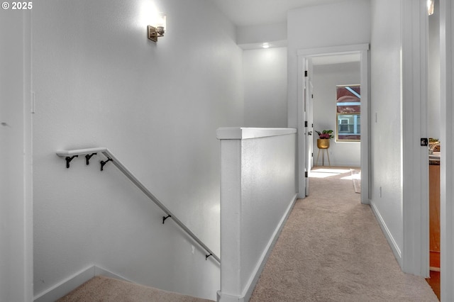4409 NE Killingsworth St Unit 103, Portland, OR 97218 - hallway with an upstairs landing and carpet floors