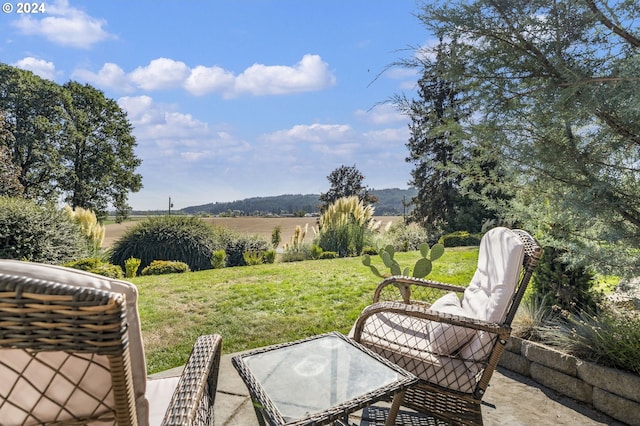 view of patio with a rural view