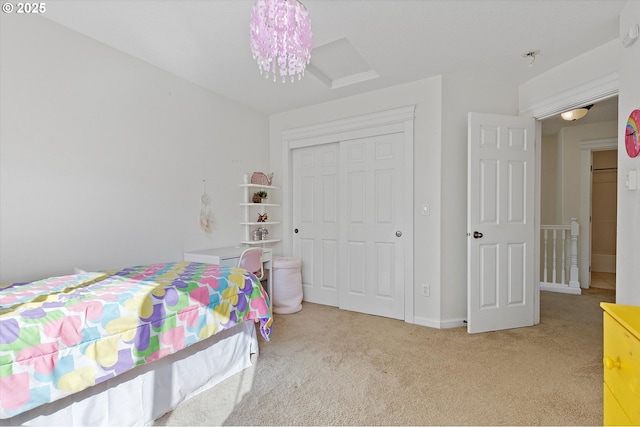 carpeted bedroom with a closet