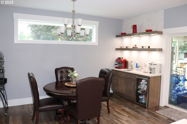 4718 NE 129th Ave, Vancouver, WA 98682 - dining area with wine cooler, bar with sink, healthy amount of natural light, and dark wood-style flooring