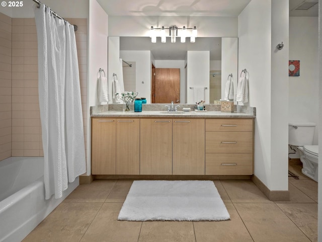 1030 NW Johnson St Unit 323, Portland, OR 97209 - full bathroom featuring toilet, tile patterned flooring, vanity, and shower / bath combination with curtain