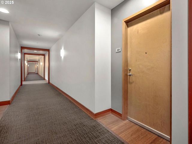 1030 NW Johnson St Unit 323, Portland, OR 97209 - corridor featuring baseboards and wood finished floors
