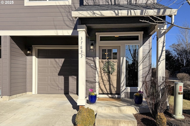 property entrance with a garage