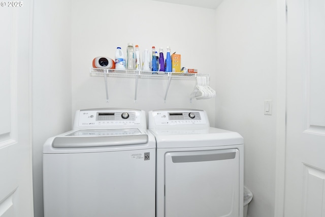 laundry room featuring washer and clothes dryer