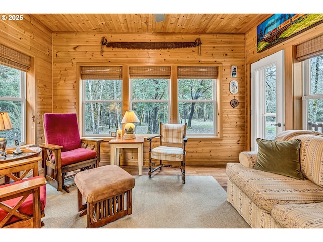 interior space with wooden ceiling and wood walls