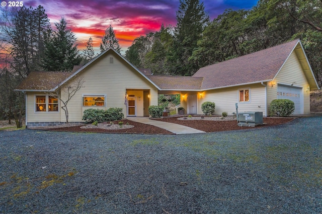 780 Pinecrest Dr, Grants Pass, OR 97526 - view of front of house featuring cooling unit and a garage