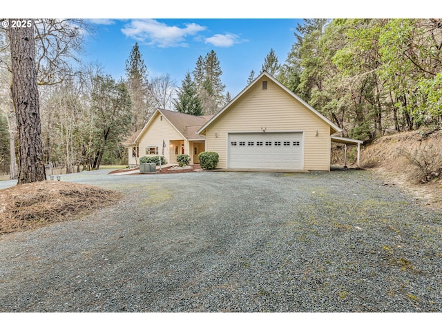 view of front of home with an attached garage and driveway