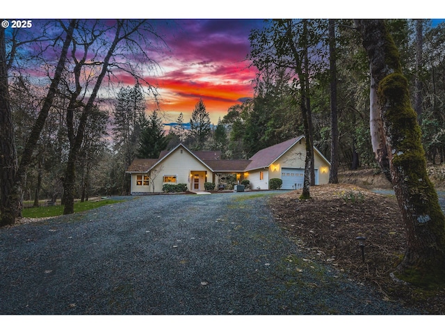 view of front facade with driveway and a garage