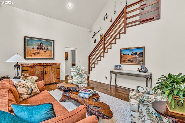 780 Pinecrest Dr, Grants Pass, OR 97526 - living area featuring stairway, high vaulted ceiling, baseboards, and wood finished floors