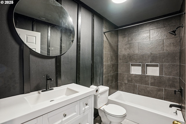 bathroom with vanity, toilet, and bathing tub / shower combination