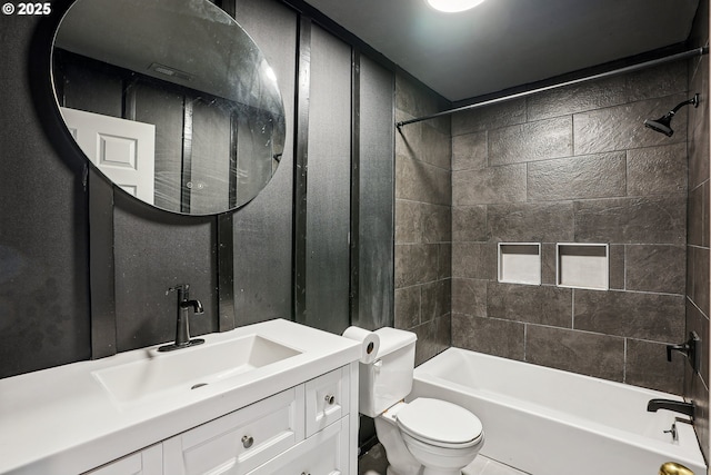 bathroom with toilet, vanity, and bathtub / shower combination