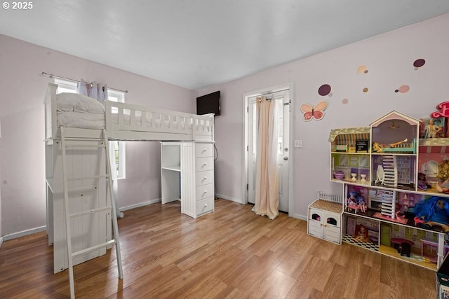 4841 Cedar St, Astoria, OR 97103 - bedroom with baseboards and wood finished floors
