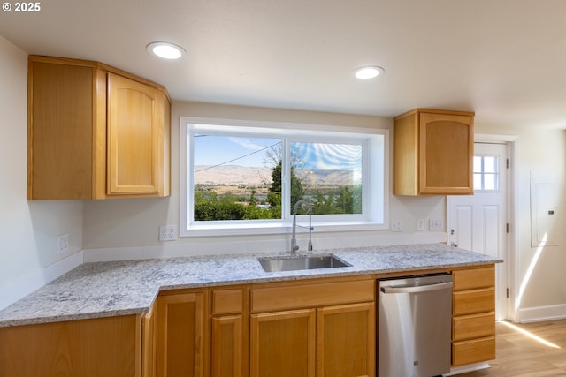 809 E 7th St, The Dalles, OR 97058 - kitchen featuring stainless steel dishwasher, light stone counters, light wood finished floors, recessed lighting, and light brown cabinets