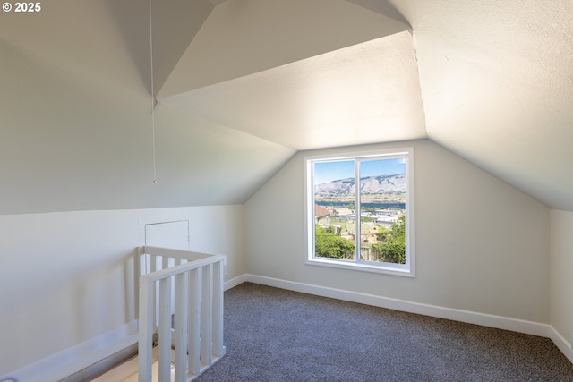 809 E 7th St, The Dalles, OR 97058 - bonus room featuring vaulted ceiling and carpet flooring