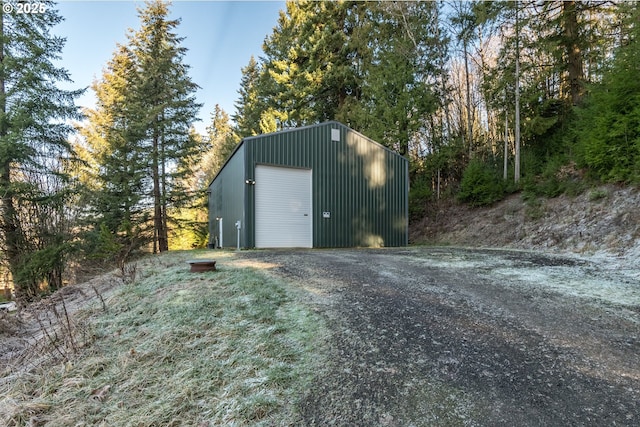 view of outbuilding with a garage