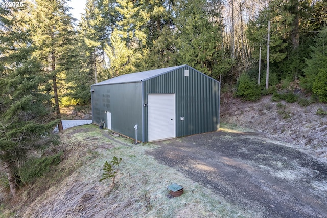 view of outbuilding with a garage