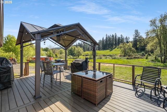 wooden deck featuring outdoor dining space