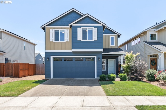 2095 S Heather St, Cornelius, OR 97113 - view of front of house featuring concrete driveway, board and batten siding, and an attached garage