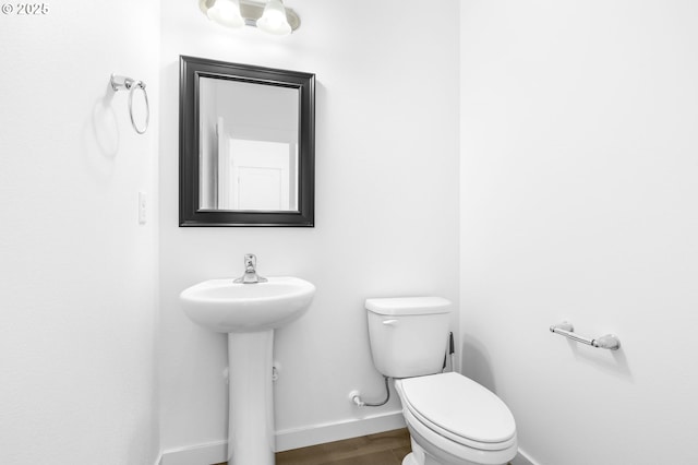 2095 S Heather St, Cornelius, OR 97113 - bathroom featuring baseboards and wood finished floors