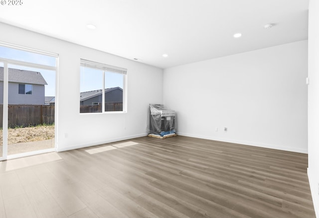 2095 S Heather St, Cornelius, OR 97113 - unfurnished room with wood finished floors and recessed lighting