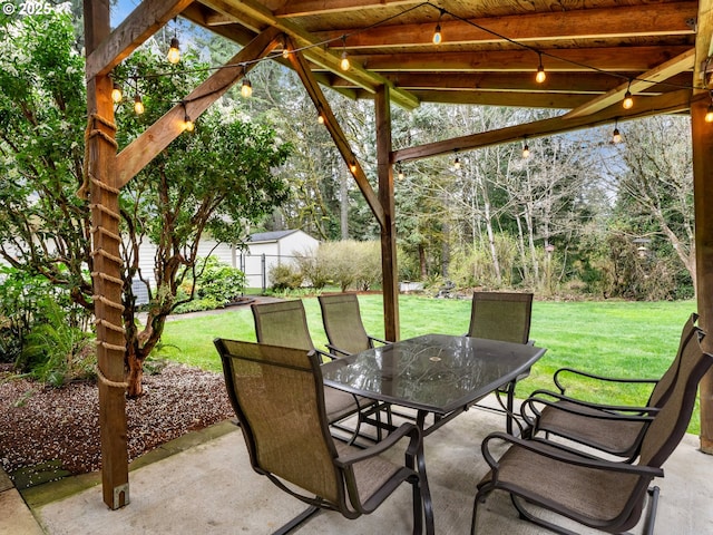 view of patio / terrace with outdoor dining area and fence