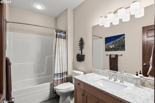 bathroom with toilet, shower / tub combo, and vanity