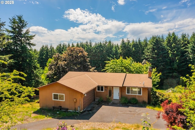 14173 NW Grandview Pl, Banks, OR 97106 - ranch-style home with driveway and a chimney