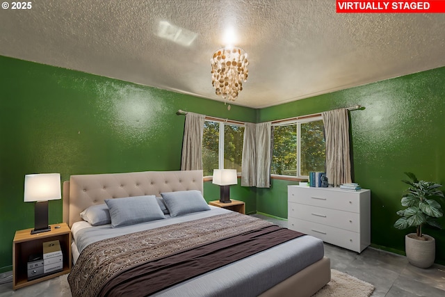 14173 NW Grandview Pl, Banks, OR 97106 - bedroom with a textured wall, a textured ceiling, and baseboards